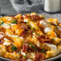 Exotic Loaded Fries · French fries mixed with chicken shawarma.