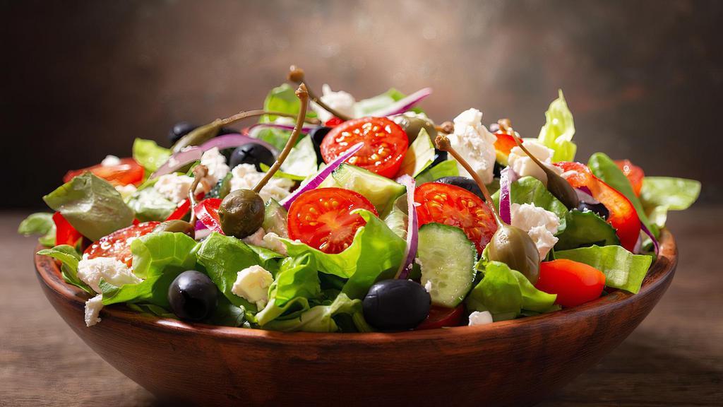 Mediterranean Salad · Lettuce, tomatoes, Persian cucumber, red onions, red cabbage, garbanzo beans with special dressing.
