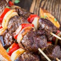 Beef Kebab · Serve with rice, hummus and bread.