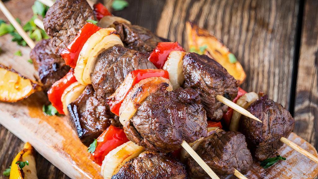 Beef Kebab · Serve with rice, hummus and bread.