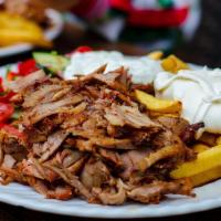 Beef Shawarma Plate · Serve with salad, rice, hummus and bread.