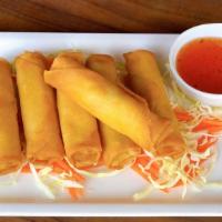 Thai Spring Rolls · Most popular. Mixed veggie rolls deep-fried and served with a mild spicy sauce.