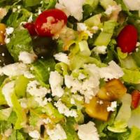 9. Greek Salad · Romaine, lettuce, tomato, cucumber, onion, olives, Feta cheese with house dressing.
