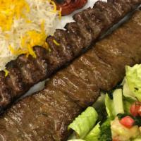 21. Fillet Mignon & Beef kabob Combo (Soltani) · A combination of barg, filet mignon and koobideh (ground beef) with rice and grilled tomato.