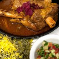 32. Baghali Polo w/ Lamb Shank · Dill and fava beans, baghali mixed wih rice and served with lamb shank.