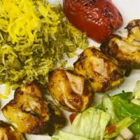 30. Baghali Polo w/ Chicken · Dill and fava beans, baghali mixed wih rice and served with chicken.