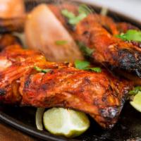 Chicken Breast Tandoori · Medium spicy. Marinated chicken breast cooked in clay oven.