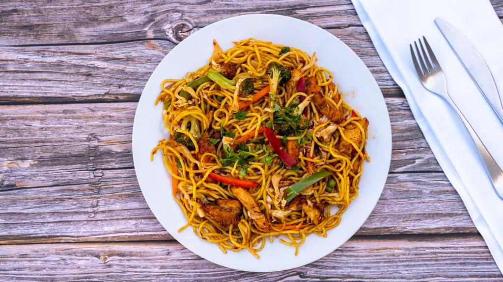 Chicken Chowmein · Stir fried noodles with chicken and vegetables, cooked with homemade spices and sauce.
