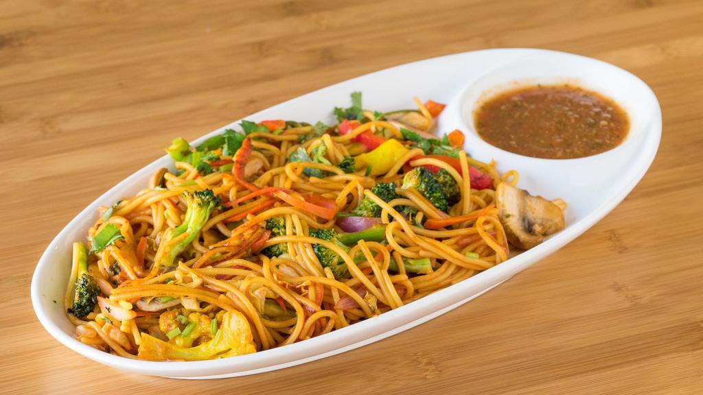 Vegetable Chowmein (Vegan) · Stir fried noodles with seasonal vegetables, cooked with homemade spices and sauce.  (vegan)