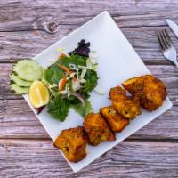 Chicken Tandoori Tikka Kabob · Chicken breast marinated overnight in garlic, ginger, yogurt, herbs and spices. (cooked in t...