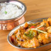 Salmon Curry · Wild caught salmon fillets cooked with homemade herbs and spices in curry sauce. Served with...