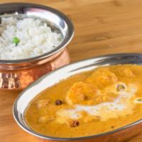 Chicken Korma · Boneless chicken thigh mildly spiced and cooked with ground cashew nuts, herbs and spices in...