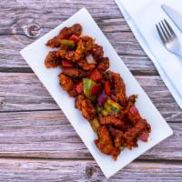 Chicken Chili · Marinated chicken breast strips pan fried with onion, bell pepper, tomato, and soy sauce. Fa...