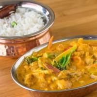 Vegetable Korma · A delicious entrée made of fresh vegetables &
homemade cheese (paneer) in a ground cashew, c...