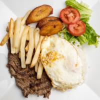Bistec A Lo Pobre · Seasoned sauté top sirloin steak, fried egg and fried plantain served with steamed white ric...