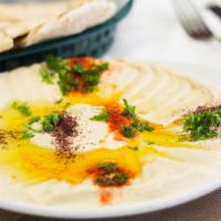6. Hummus · A delightful dip of garbanzo beans, tahini, garlic, lemon juice, and olive oil.