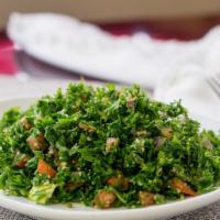 8. Tabbouleh · A salad of cracked wheat, parsley, tomatoes, onions, lemon juice, and olive oil.