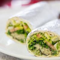 22. Veggie Wrap · A blend of lettuce, hummus, dolmas, eggplant, tomatoes, and tabbouleh all in a lavash wrap.
