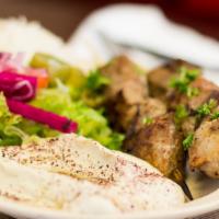 28. Beef Shish Kabob Wrap · Tender marinated beef sirloin on a skewer char-broiled then pulled onto lavash bread with le...