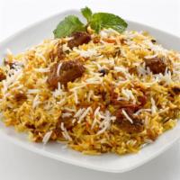 The Lamb Biryani · An aromatic rice dish made with long-grained rice, savory lamb, and homemade spices.