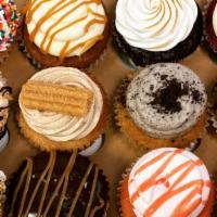 Signature Size Variety 12 Pack · Variety of assorted gourmet cupcakes available day of order.  (Check website for daily flavo...