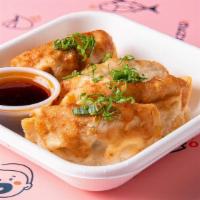 Krispy Chicken Gyoza · Chicken Gyoza with Green Onions served with a side of Gyoza Sauce (4 pieces)