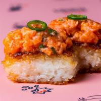King Salmon & Yuzu Krispy Rice · Salmon Yuzu, Grilled Sushi Rice, topped with Serrano (2 pieces)