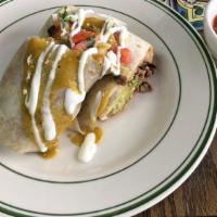 Carne Asada Burrito · Grilled steak with sauce. Include rice, beans, guacamole, cheese, sour cream, lettuce and sa...