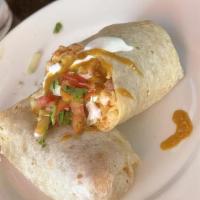 Chicken (Pollo) Burrito · Cooked vegetables & salsa. Include rice, beans, guacamole, cheese, sour cream, lettuce and s...