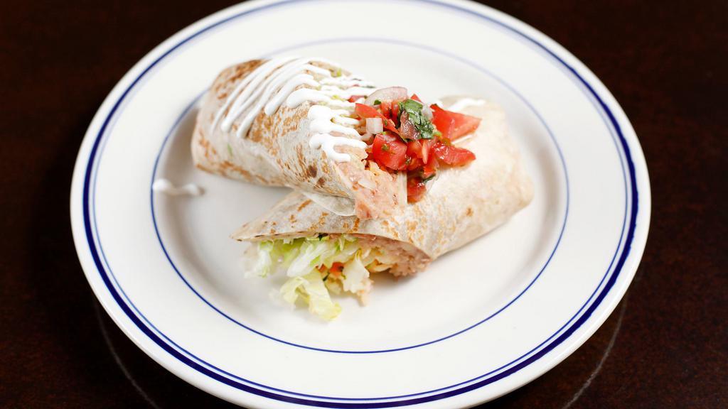 Veggie Burrito · Zucchinis, carrots, peppers & onions. Include rice, beans, guacamole, cheese, sour cream, lettuce and salsas.