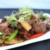 Black Pepper Beef Filet · mushroom medley | tellicherry peppercorn | onions | chili pod