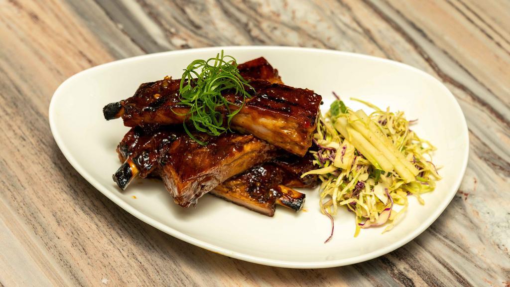 Jing Du Ribs · spicy apple cabbage slaw | sweet heat glaze | st. louis style pork ribs