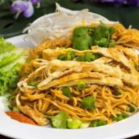 Khaw Mee (Lao Stir Fry Noodle) · Vegetarian. Rice noodles with sweet soy sauce top with eggs and garnished with green onions,...