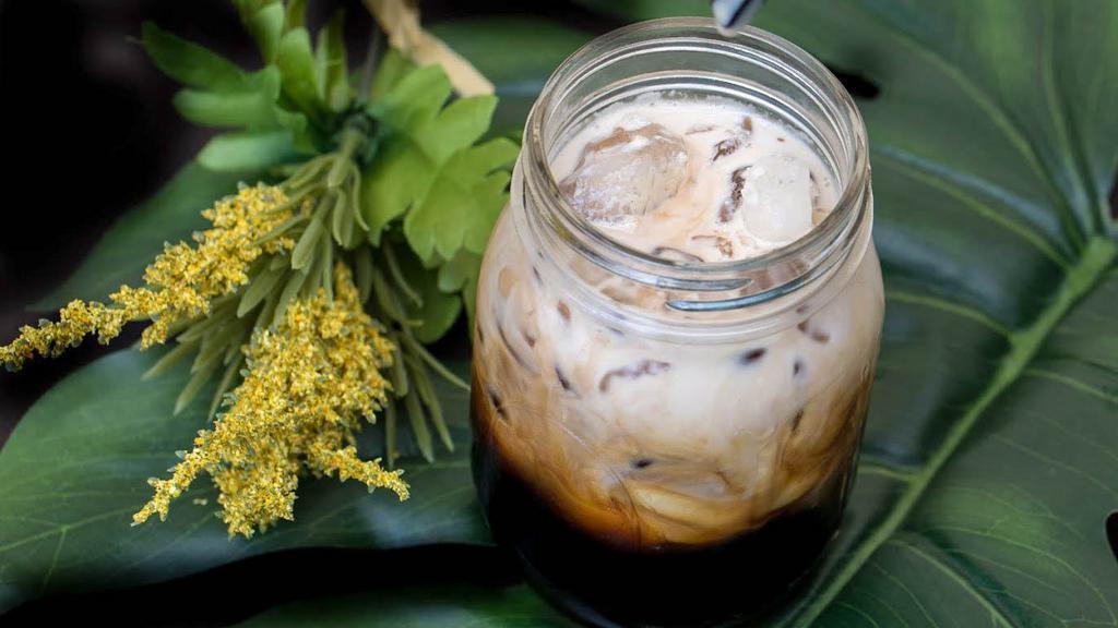 Thai Iced Coffee · Rich thai coffee freshly brewed with added sugar and half & half milk.