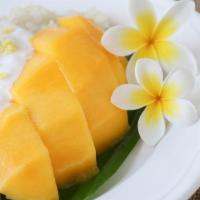 Mango Sticky Rice · Sticky rice with Mango and coconut milk topping.