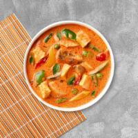 Red Curry Chicken · Red curry; chicken simmered with coconut milk, bamboo shoots, bell pepper and Thai basil. Me...