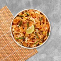 Pad Thai Shrimps · Rice noodles pan-fried with prawns, chili powder, egg, green onion, bean sprouts and peanut....