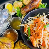 Lao's Platter · Serves 2-4. Papaya salad, barbecue chicken, Lao sausage, pork rinds, hard boiled egg,  stick...