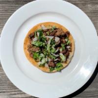 Tacos · Any meat, onions, cilantro, salsa.