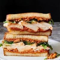 Hot Turkey Sandwich · Turkey along with tomatoes, onions, pickles, lettuce, mayonnaise and honey mustard.side of f...