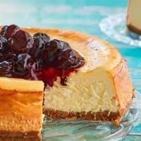 New York Cheesecake · Slice of rich smooth and creamy cheesecake.