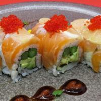 Candlestick · Asparagus and avocado roll topped with arctic char, lemon, and red tobiko gluten free availa...