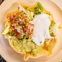 Tostada Bowl · Option of with or without tortilla shell, choice of meat, rice, beans, cheese, guacamole, so...