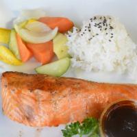 Salmon Teriyaki · Grilled fresh salmon with teriyaki sauce, served with sautéed vegetables & rice.