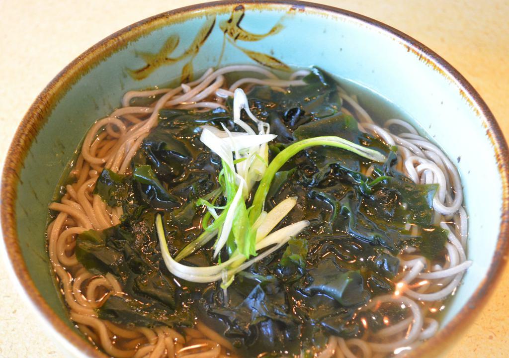 Wakame Soba  · Soba noodles and broth with seaweed and scallion.