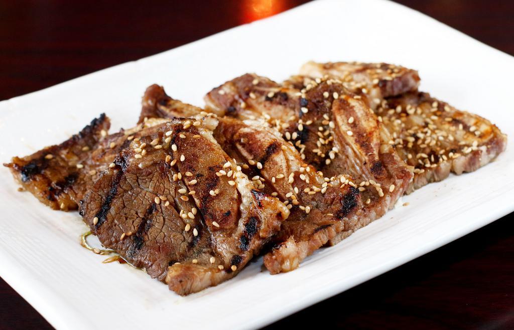 Short Rib Teriyaki · Grilled and marinated bone-in beef.