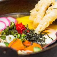 Nabeyaki · Your choice of noodle in broth with shrimp tempura, grilled chicken, squid and egg.