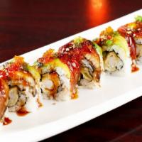 Dragon Roll · Shrimp tempura and cucumber, topped with unagi and avocado and sesame seed.