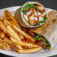 Fried Chicken Tortilla Wrap · A toasted flour tortilla filled with chopped fried chicken pieces, shredded Monterrey Jack c...