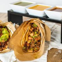 La Taqueria Tacos · 2 pieces. Crispy cheesy double stuffed tacos with pinto beans, choice of protein, salsa fres...